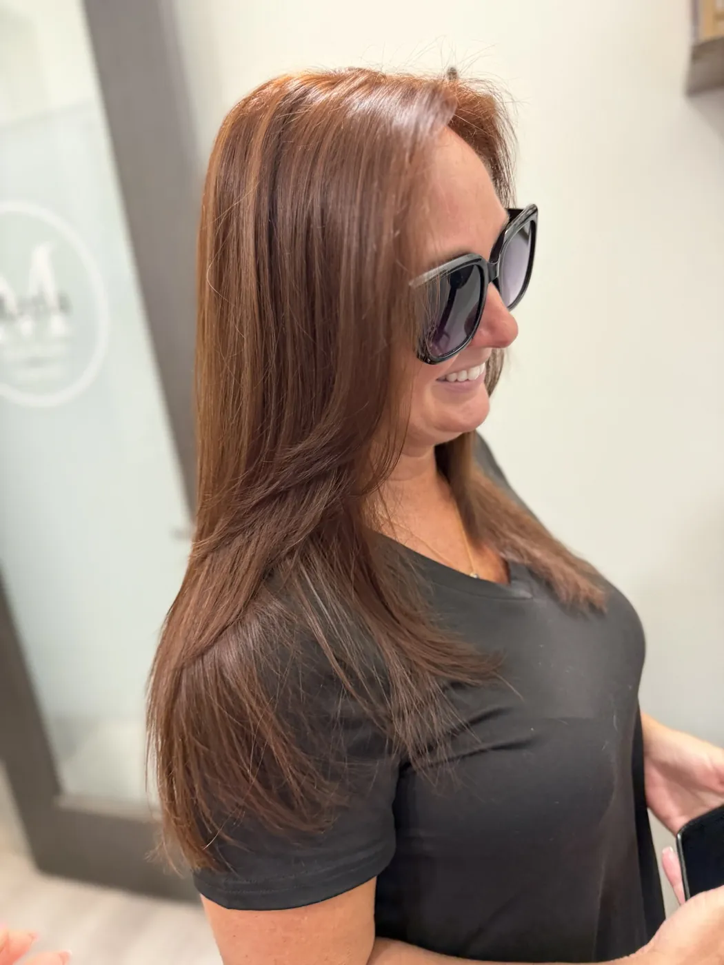 A rich auburn, hand-mixed and glossed to a shine