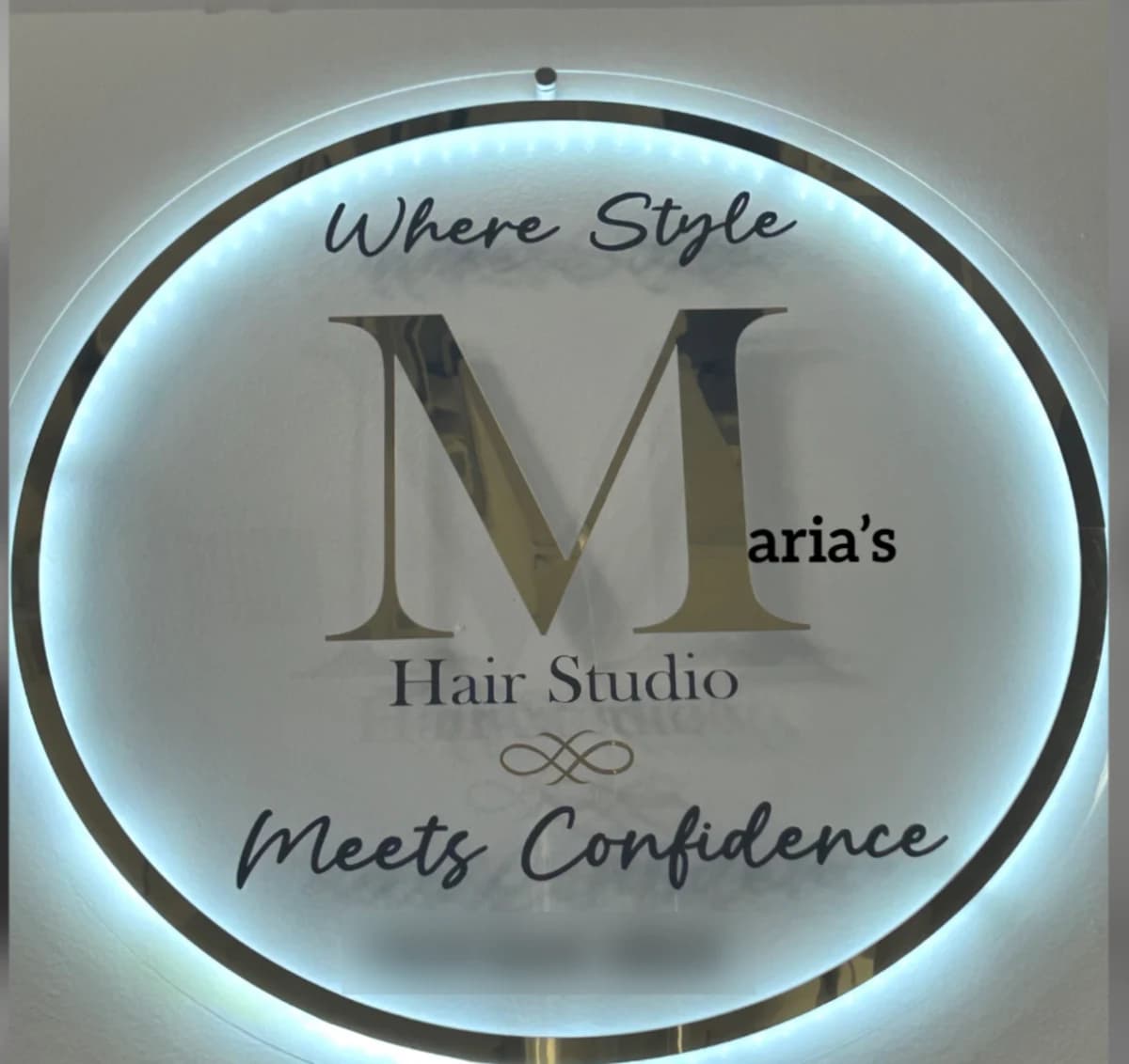 The Maria’s Hair Studio sign: Where Style Meets Confidence